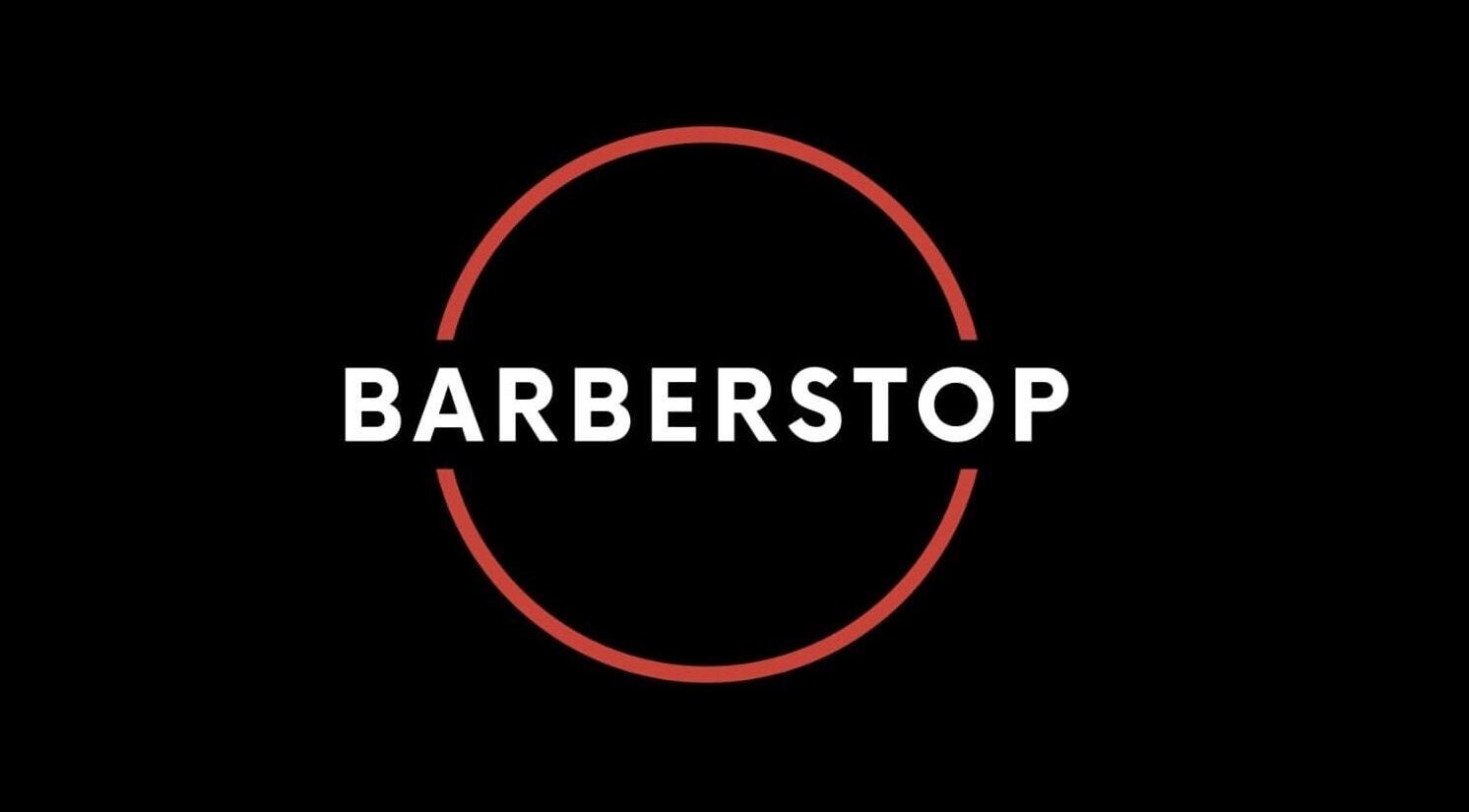 Elegant Barber Stop logo on black background, Birmingham, England, GB.