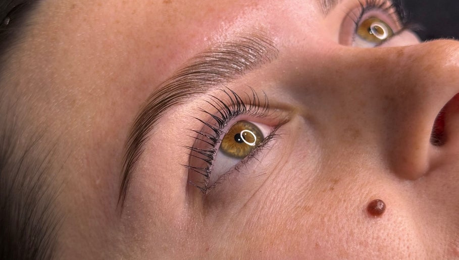 Close-up of perfectly groomed eyebrows and lashes at Brow House Syd, Hassall Grove, New South Wales, AU.