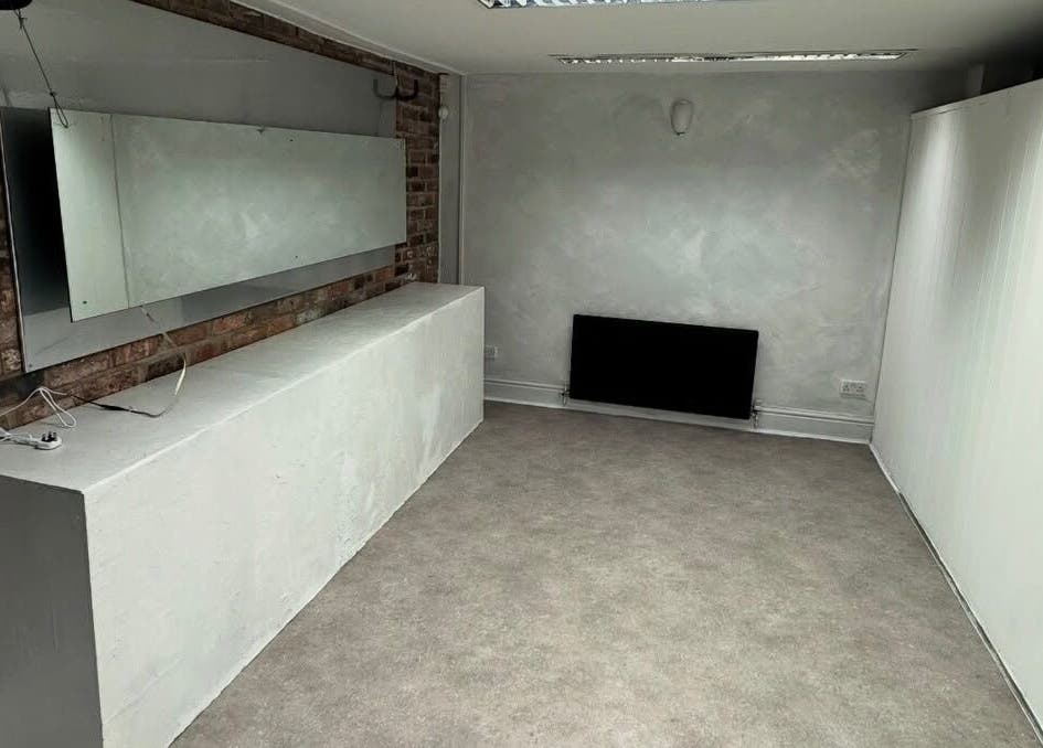 Minimalist salon interior of Demi The Hairdresser in Manchester, England, GB with stylish decor.