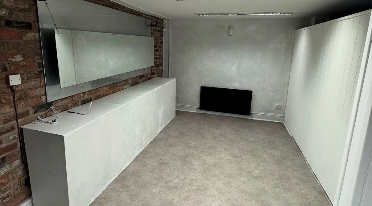 Minimalist salon interior of Demi The Hairdresser in Manchester, England, GB with stylish decor.