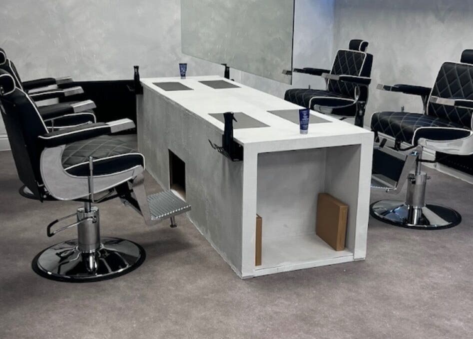 Modern hairdressing chairs at Demi The Hairdresser in Manchester, England, GB providing a chic styling experience.