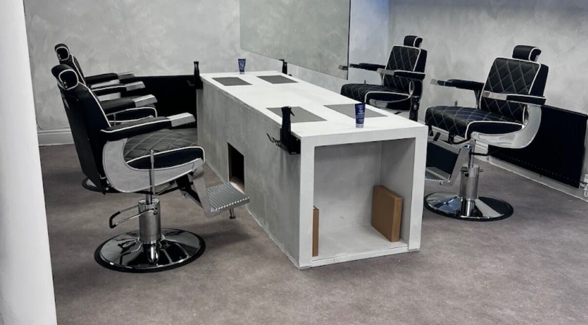 Modern hairdressing chairs at Demi The Hairdresser in Manchester, England, GB providing a chic styling experience.
