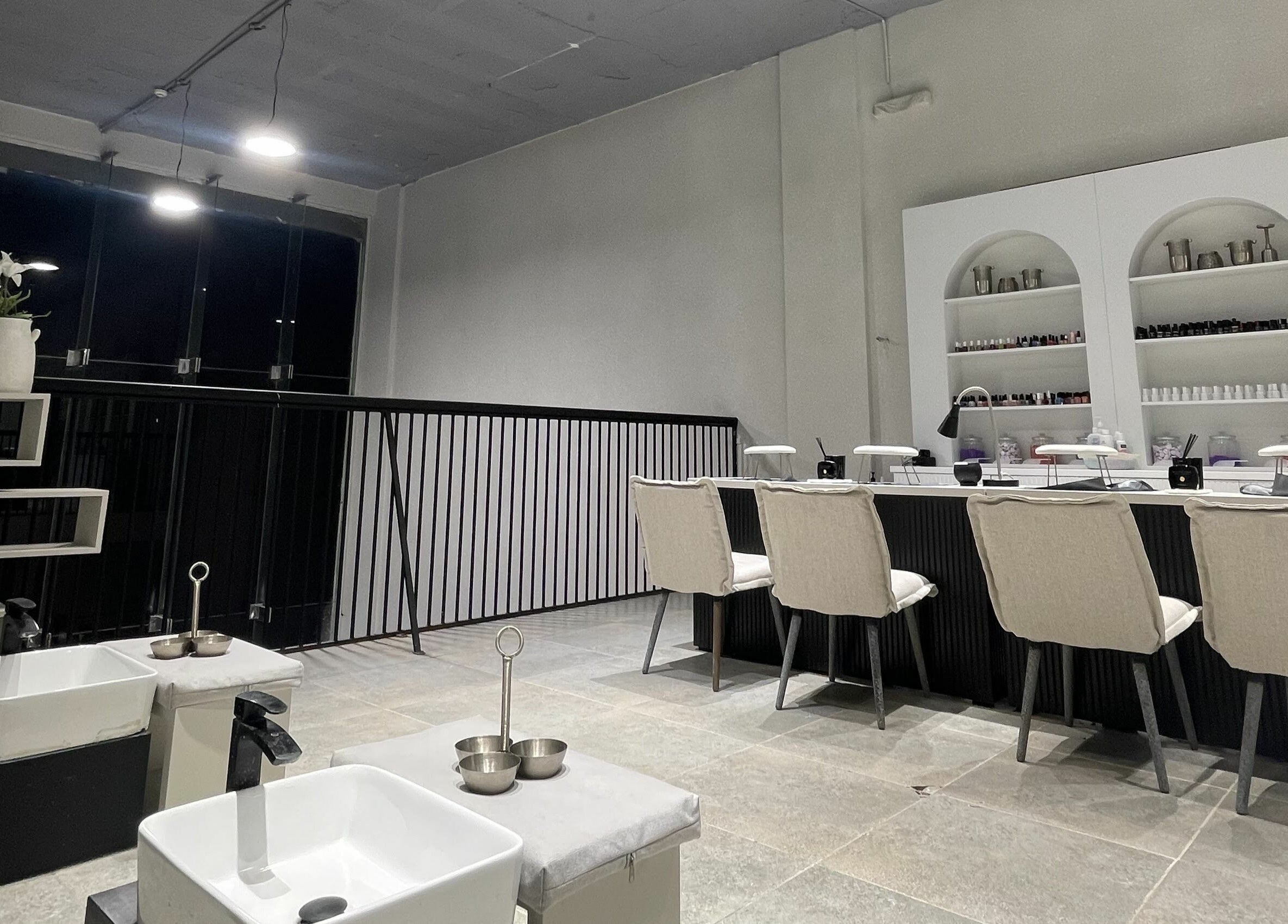 Modern salon interior at The Golden Hour, Riyadh, Riyadh Province, SA with elegant manicure stations.