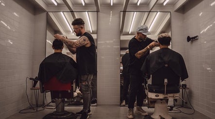 Barbers styling hair at Shag High Voltage Hair in Port Elizabeth, Eastern Cape, ZA.
