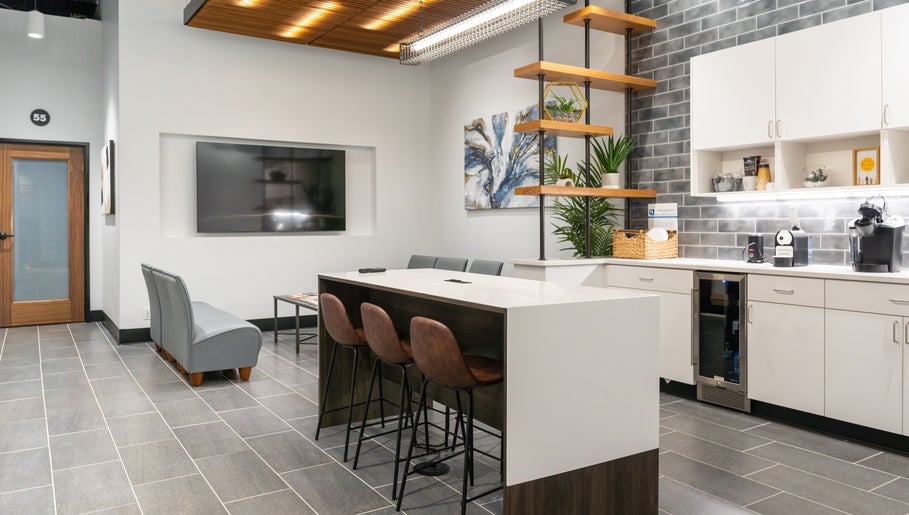 Chic lounge area at Xo Beauty in North Wales, Pennsylvania, US with sleek furnishings and contemporary decor.