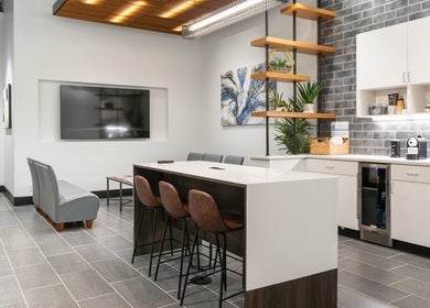 Chic lounge area at Xo Beauty in North Wales, Pennsylvania, US with sleek furnishings and contemporary decor.