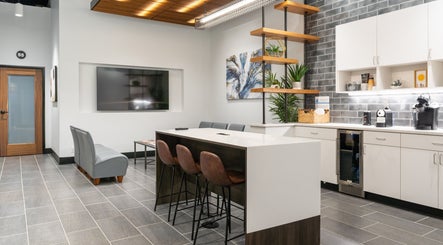 Chic lounge area at Xo Beauty in North Wales, Pennsylvania, US with sleek furnishings and contemporary decor.