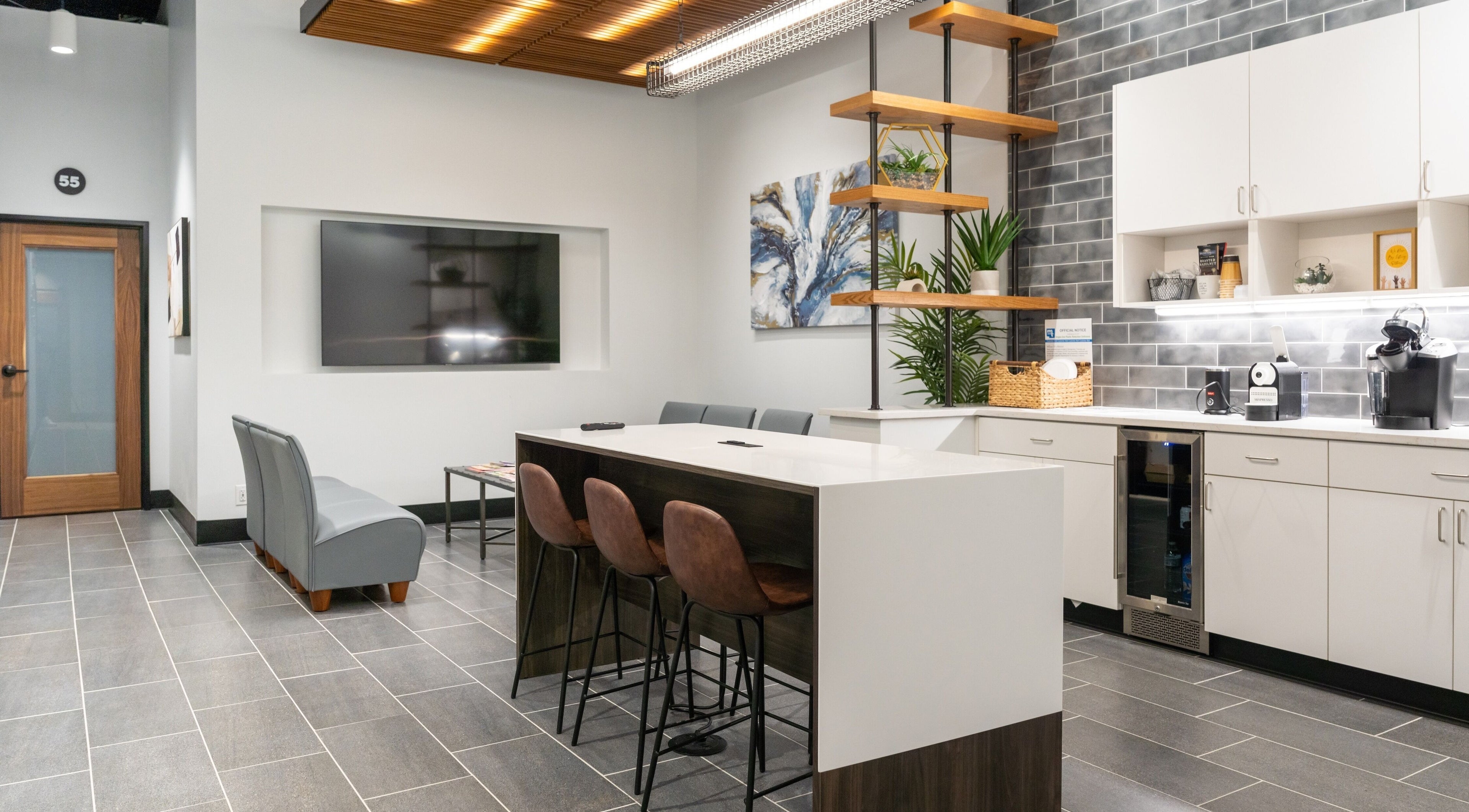 Chic lounge area at Xo Beauty in North Wales, Pennsylvania, US with sleek furnishings and contemporary decor.