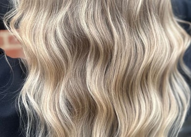 Blonde wavy hair styled at Xo Beauty, North Wales, Pennsylvania, US salon.