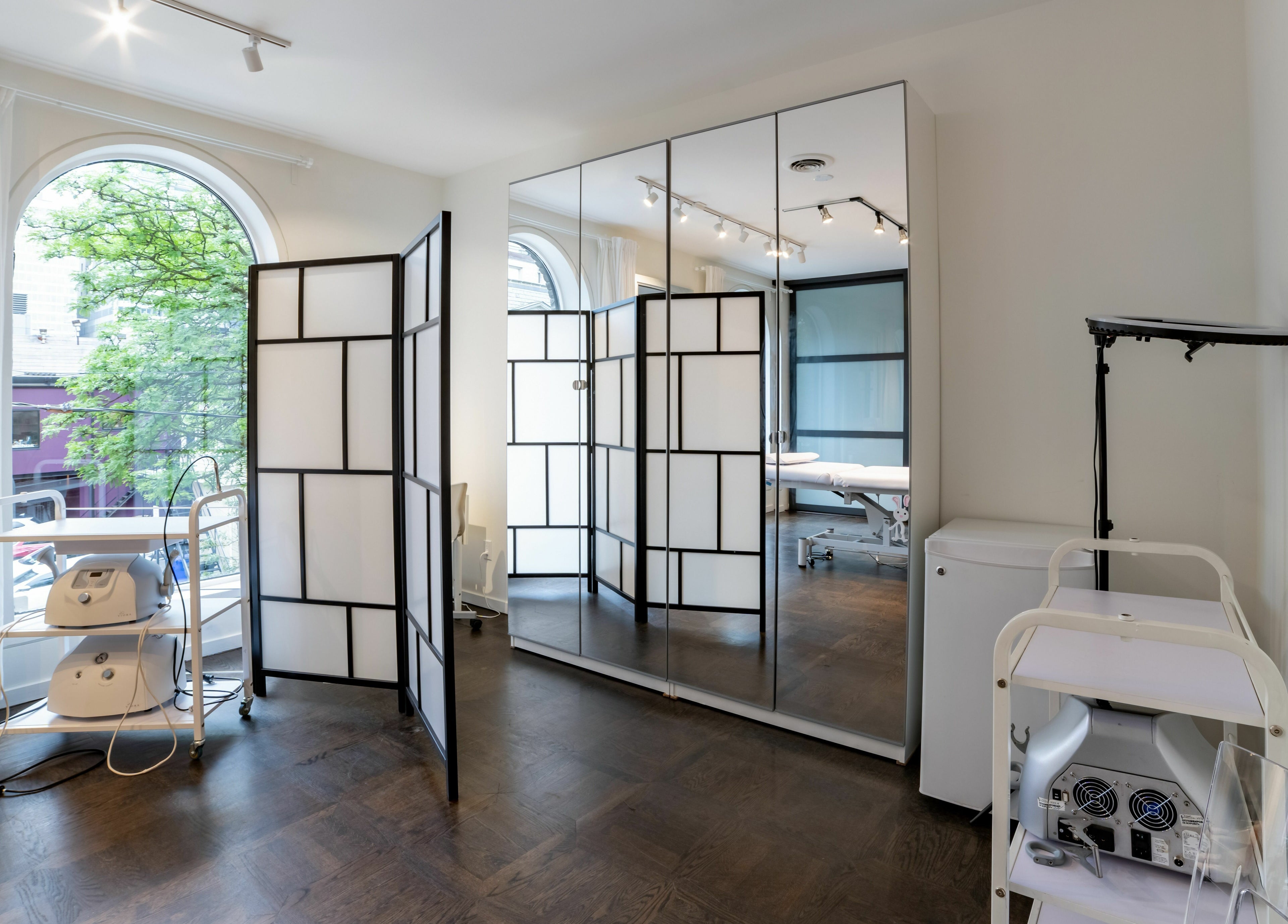Elegant treatment room at MedVSpa in Toronto, Ontario, CA with modern equipment and chic decor.
