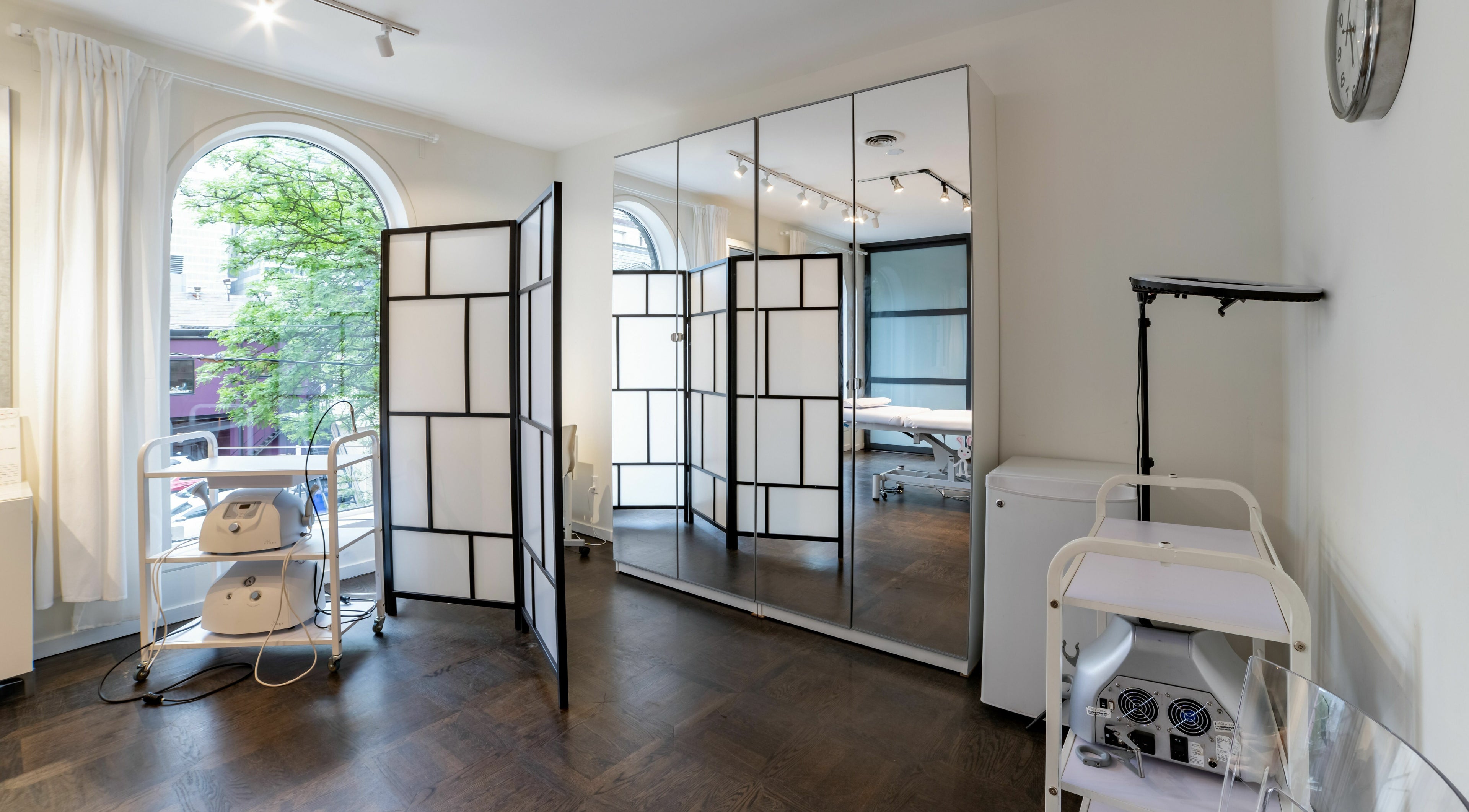 Elegant treatment room at MedVSpa in Toronto, Ontario, CA with modern equipment and chic decor.