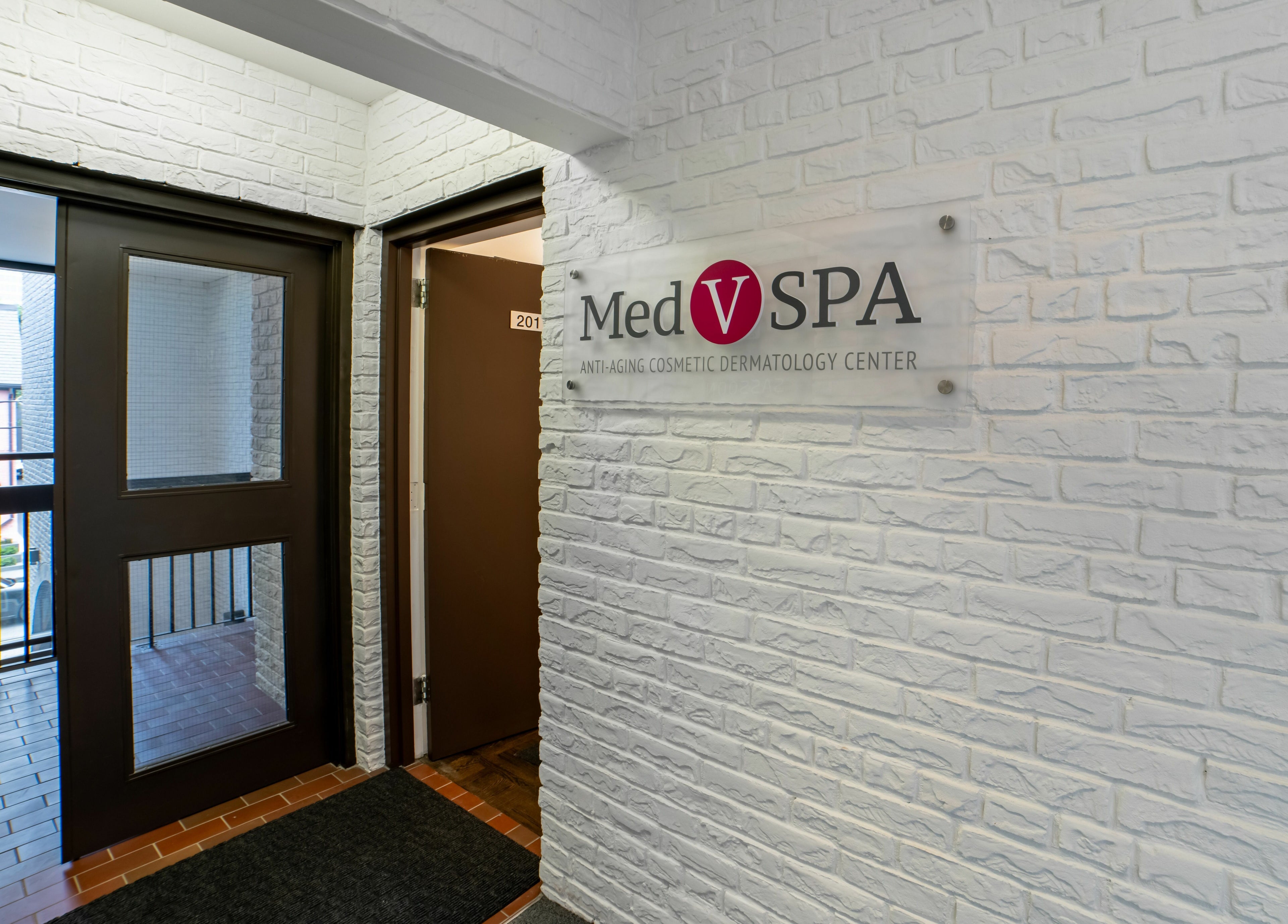 Entrance to MedVSpa in Toronto, Ontario, CA, showcasing modern decor and a welcoming atmosphere.