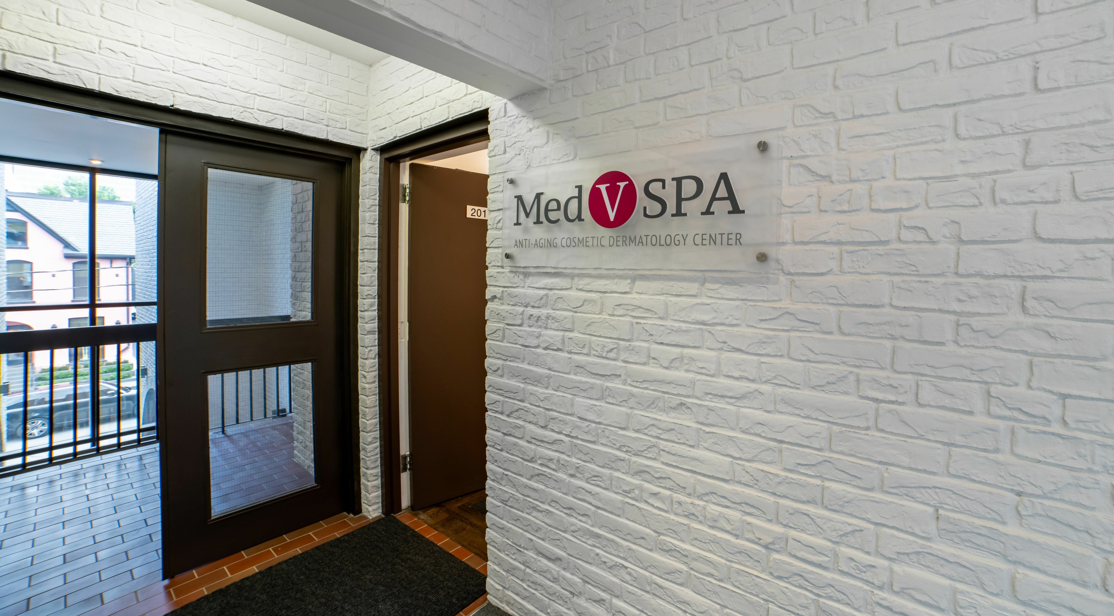Entrance to MedVSpa in Toronto, Ontario, CA, showcasing modern decor and a welcoming atmosphere.