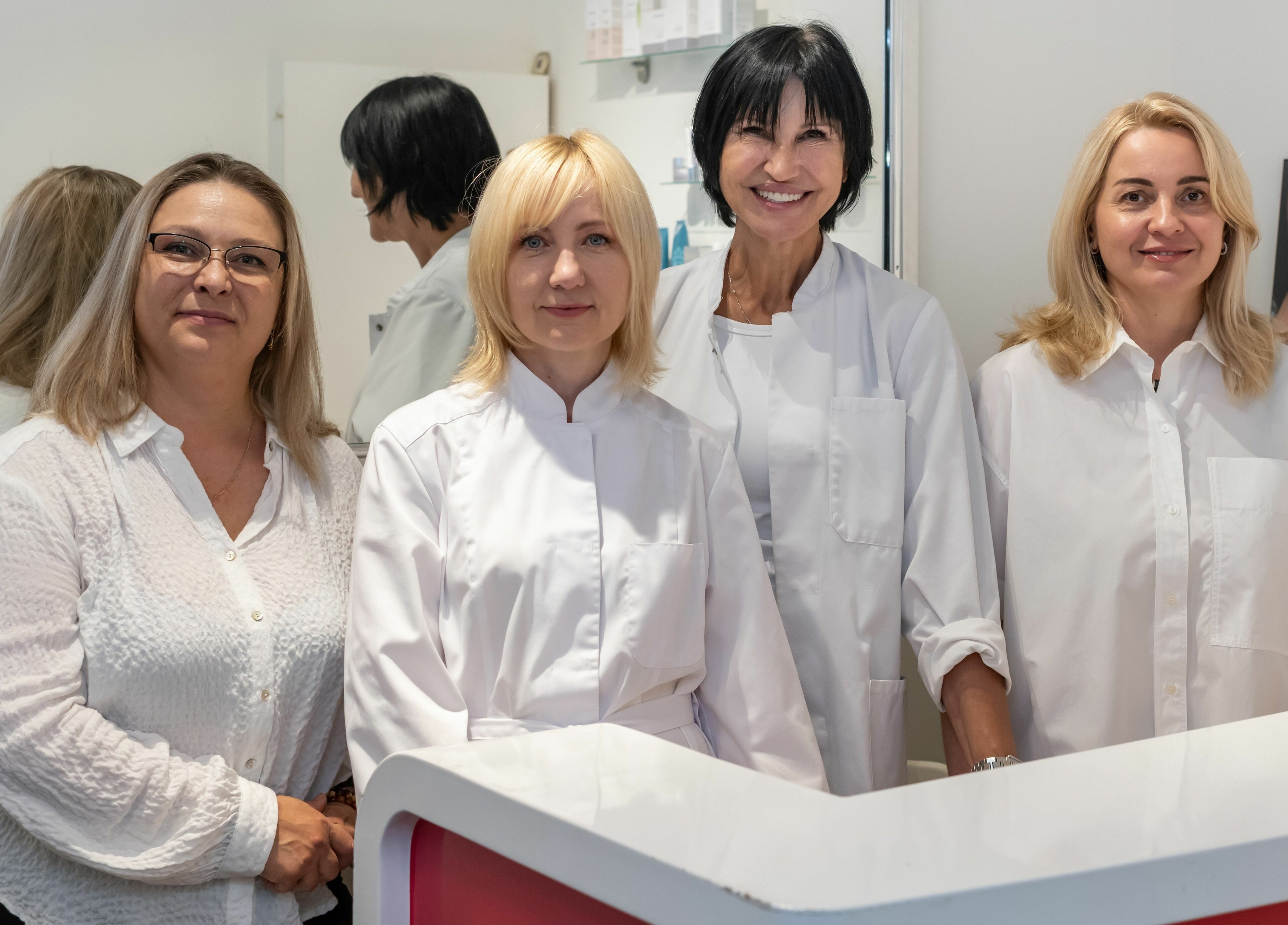 Friendly staff at MedVSpa reception in Toronto, Ontario, CA, ready to assist with beauty and wellness needs.