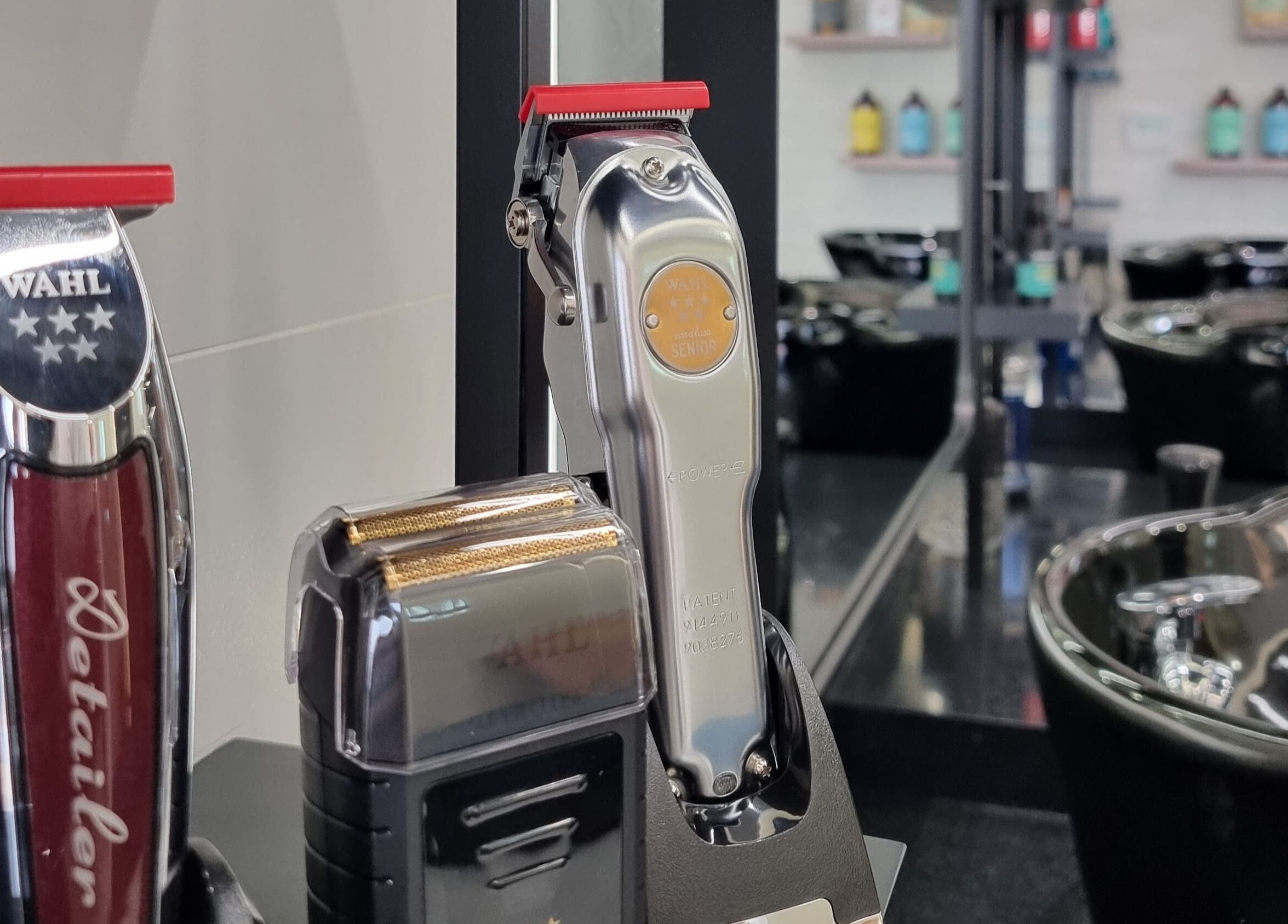 Professional clippers displayed at Pitstop Barbers, Dubai, AE. Enhancing your grooming experience.