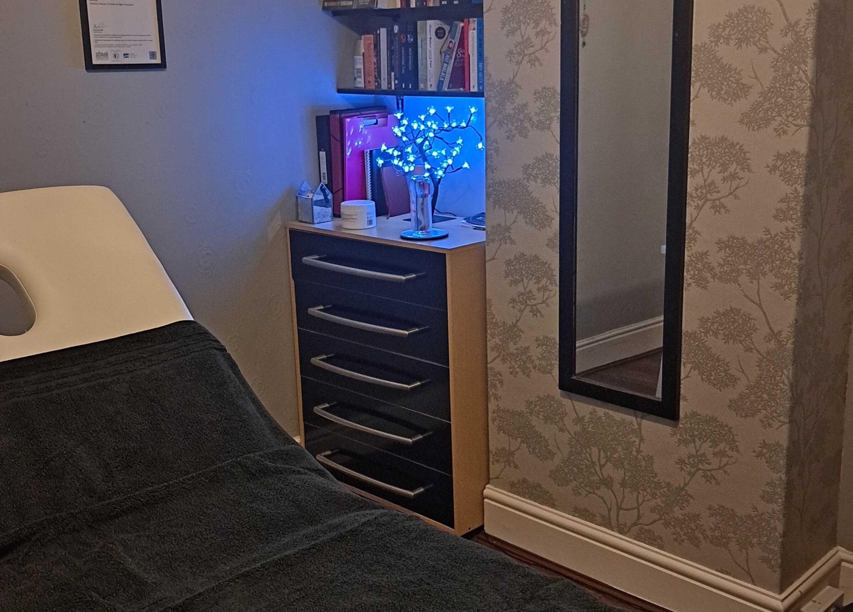 Massage room with a bed and calming decor at EA Massage Therapy, Grimsby, England, GB.