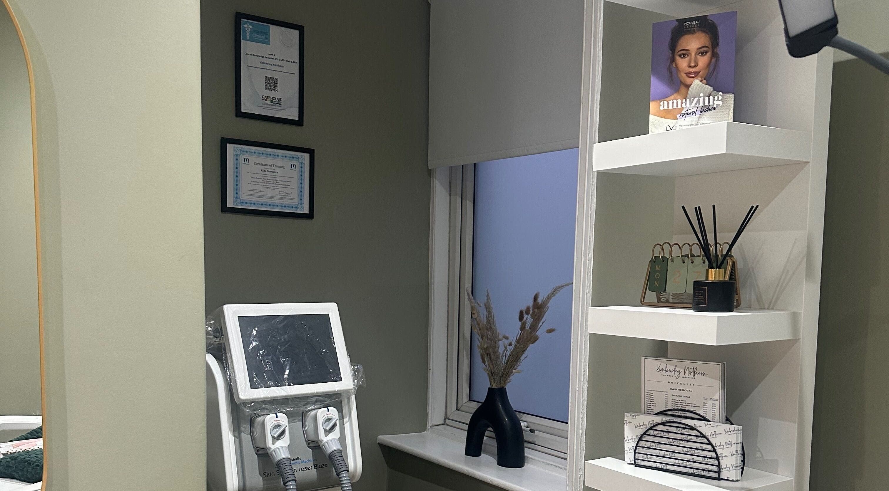 Stylish corner at KN The Brow and Laser Lab, Ossett, England, GB, featuring equipment, decor on shelves.