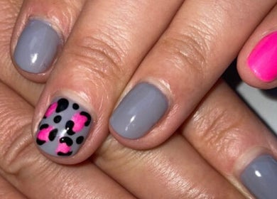 Stylish leopard print nail art at Bliss Home Beauty, Buntingford, England, GB.