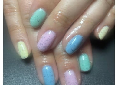 Vibrant pastel nail art at Bliss Home Beauty, Buntingford, England, GB. Perfectly polished for a chic look.