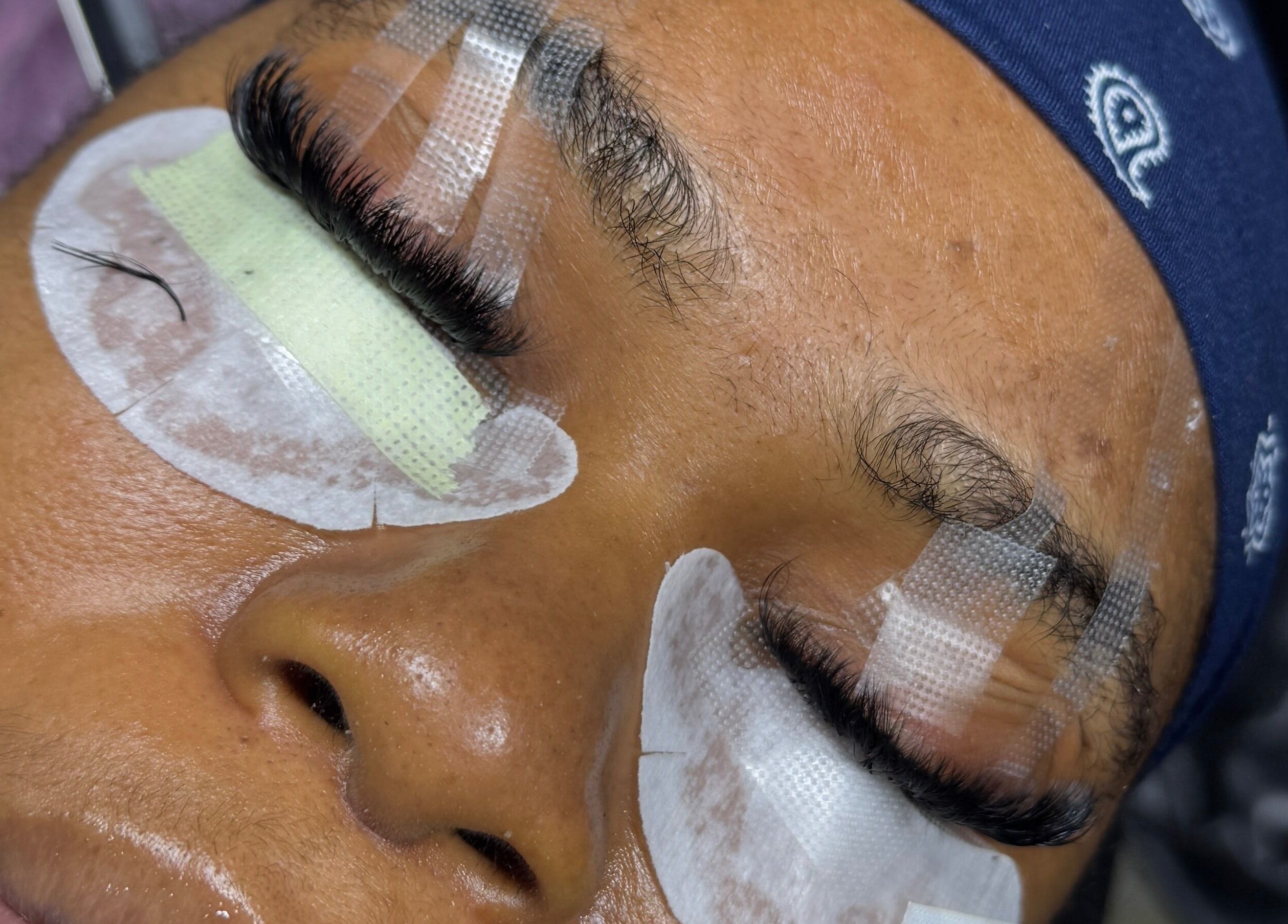 Close-up of a lash extension treatment at TemiAllureStudio, Lagos, Lagos, NG.