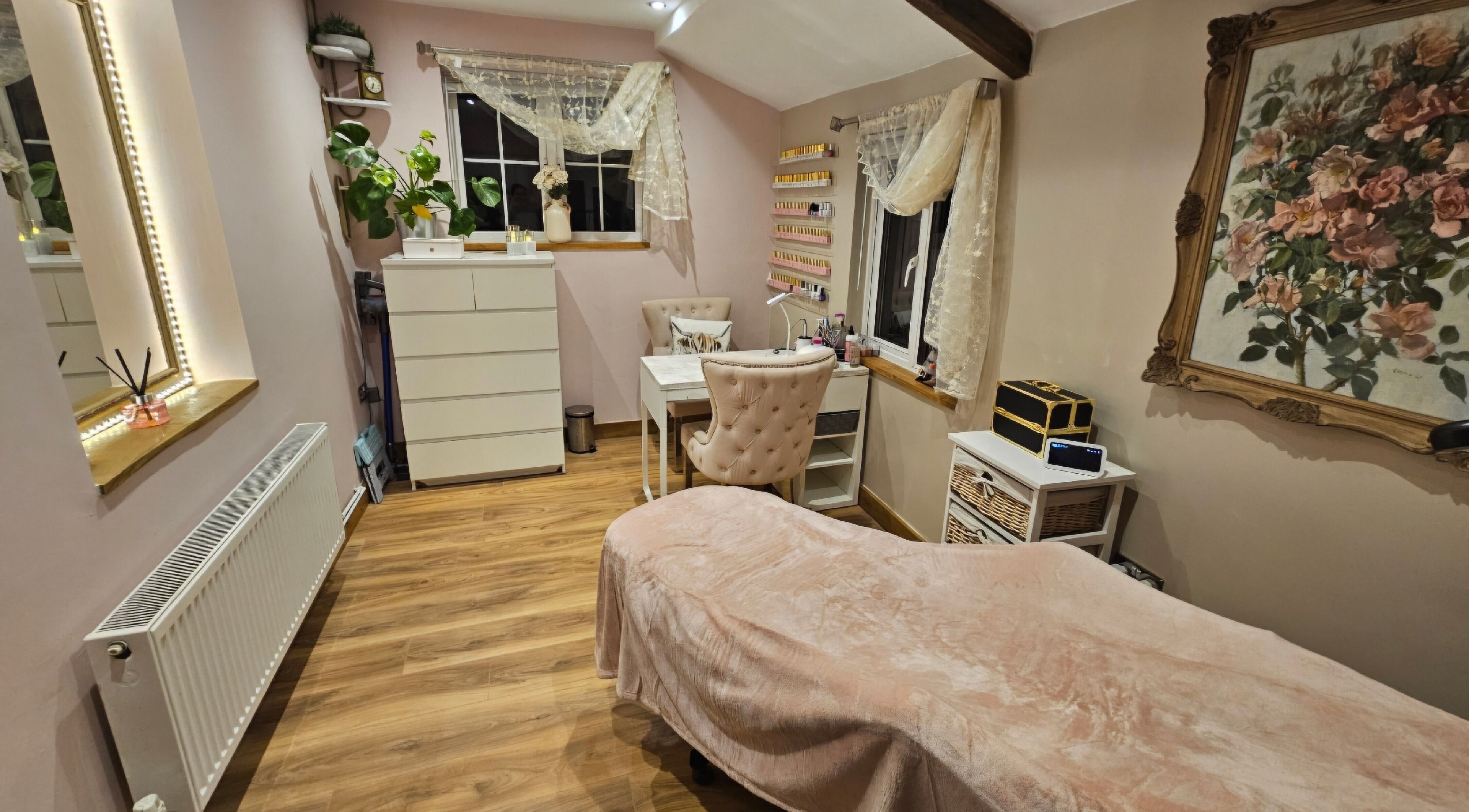 Elegant beauty room at On the Lash, Inwardleigh, United Kingdom, GB with decor and wooden flooring.