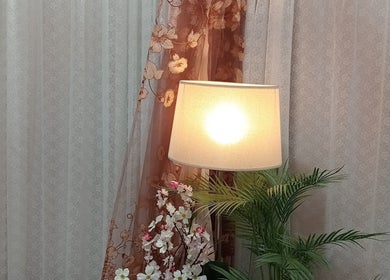 Elegant lamp and floral decor at Siam Kinnaree Thai Massage, Fremantle, Western Australia, AU.