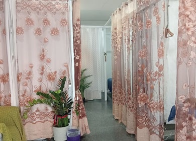 Elegant floral curtains at Siam Kinnaree Thai Massage, Fremantle, Western Australia, AU, create a serene ambiance.