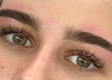 Close-up of perfectly shaped eyebrows and lush lashes at Lashed Up UK, Portsmouth, England, GB.