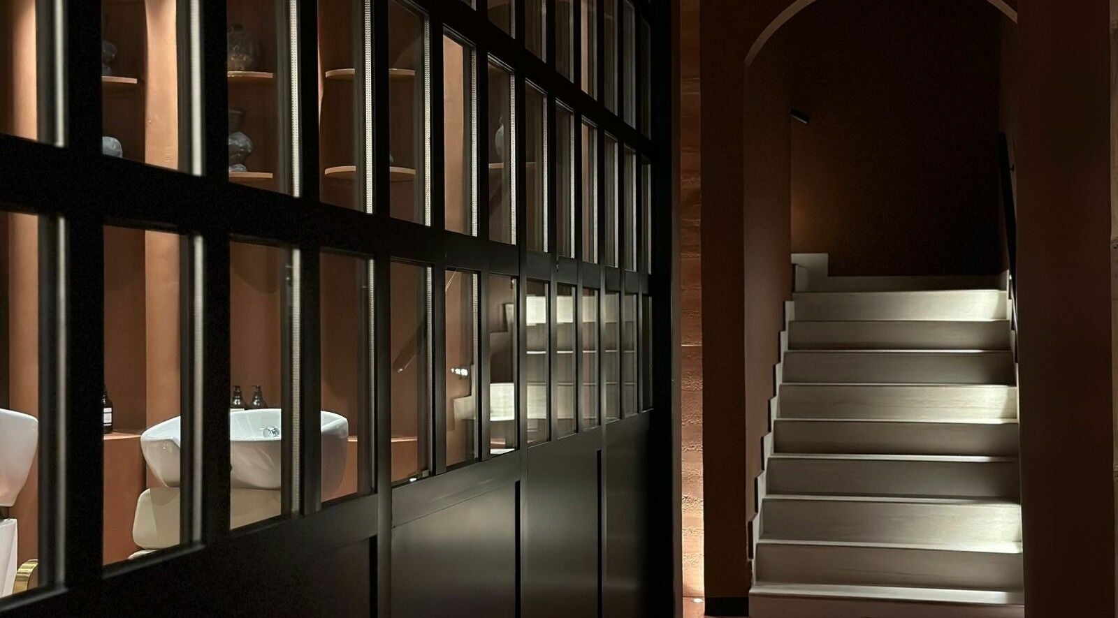 Elegant stairway at Clarity Spa | كلارتي سبا, Riyadh, Riyadh Province, SA. Modern design with ambient lighting.