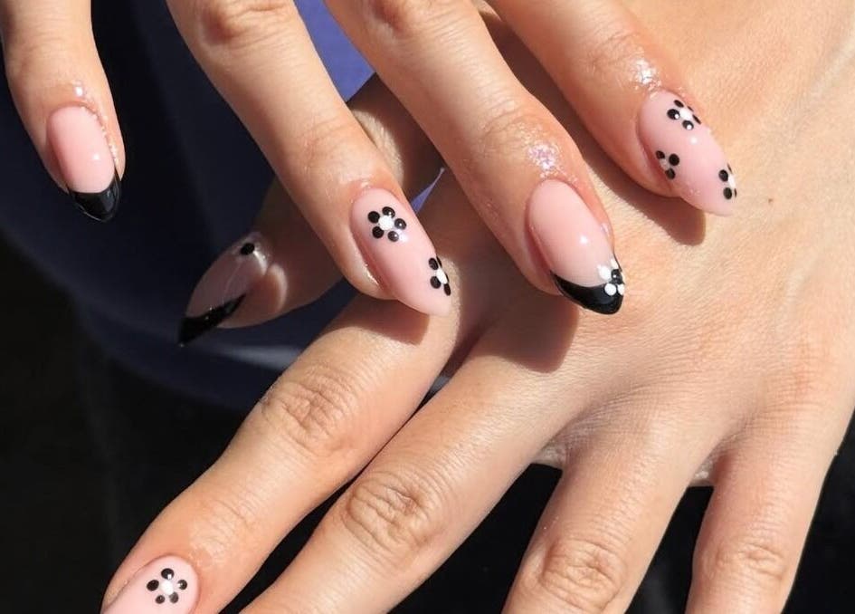 Chic floral and French nail design at Nailsbyzqt, Tāhuna, Ōtākou, NZ, showcasing elegance and style.