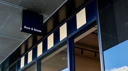 Entrance sign of Boar and Blade Ponsonby, Auckland, Auckland, NZ showcasing sleek blue design.