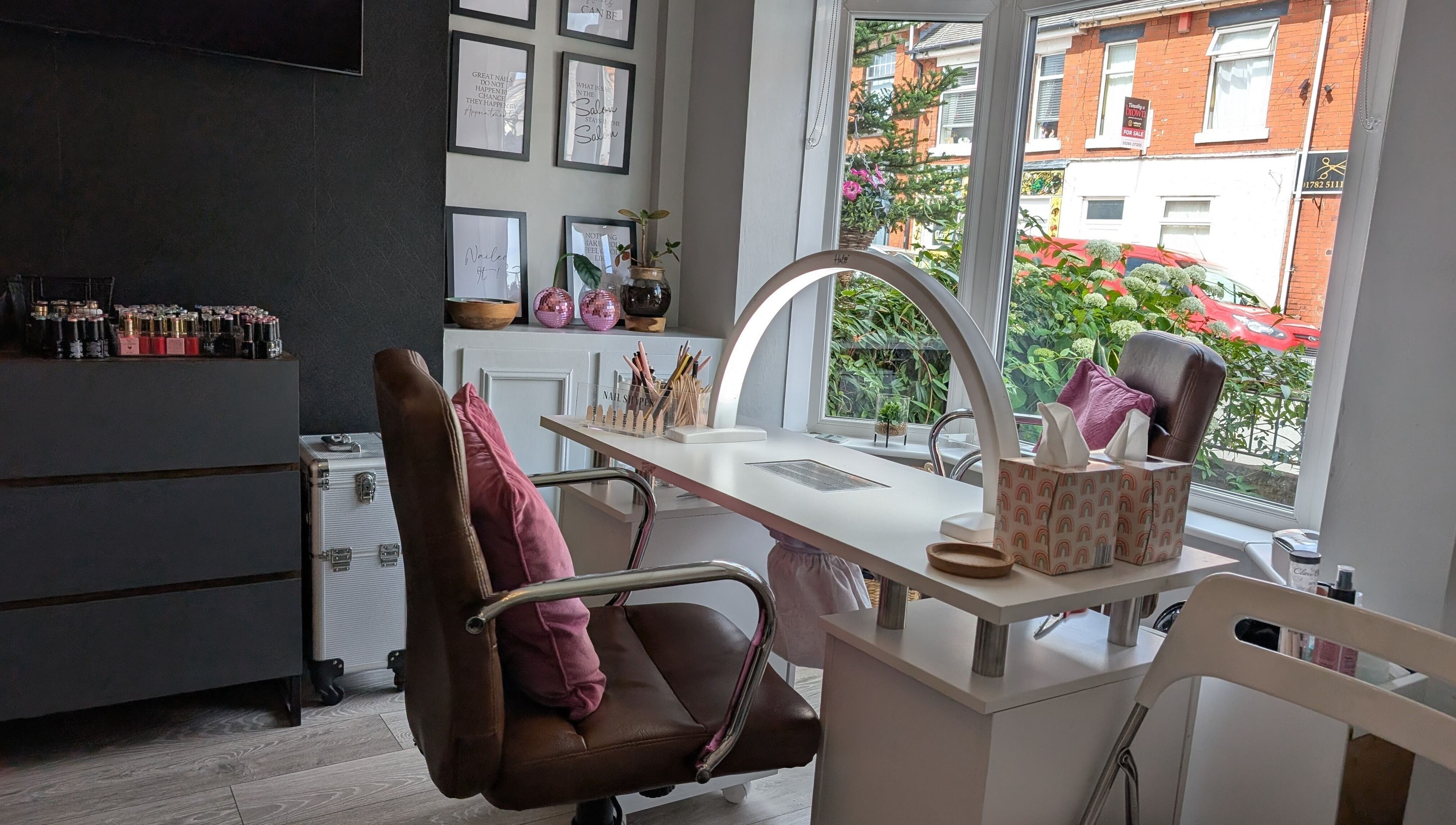 Stylish nail station at Nails by Paula X in Biddulph, England, GB with natural light and cozy ambiance.