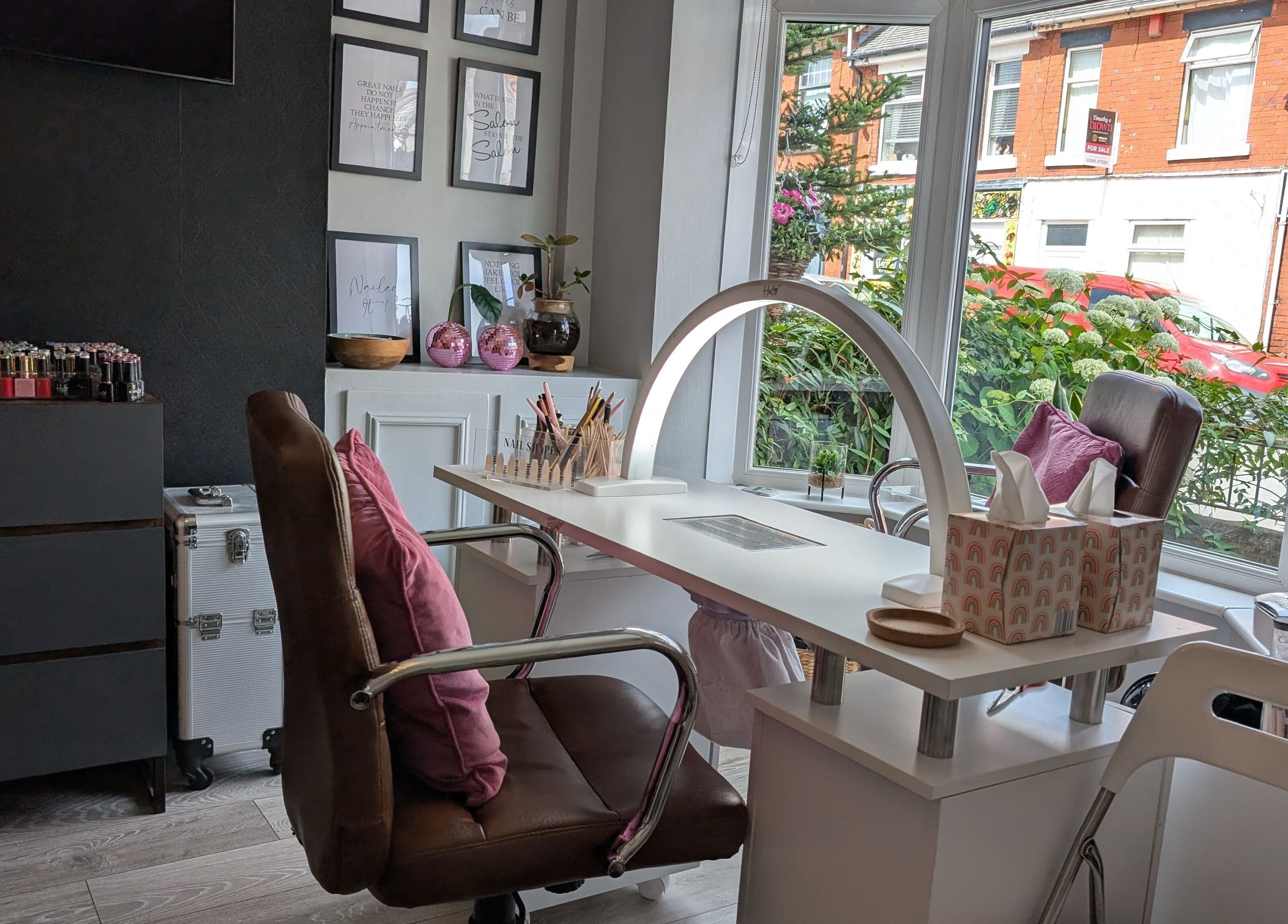 Stylish nail station at Nails by Paula X in Biddulph, England, GB with natural light and cozy ambiance.