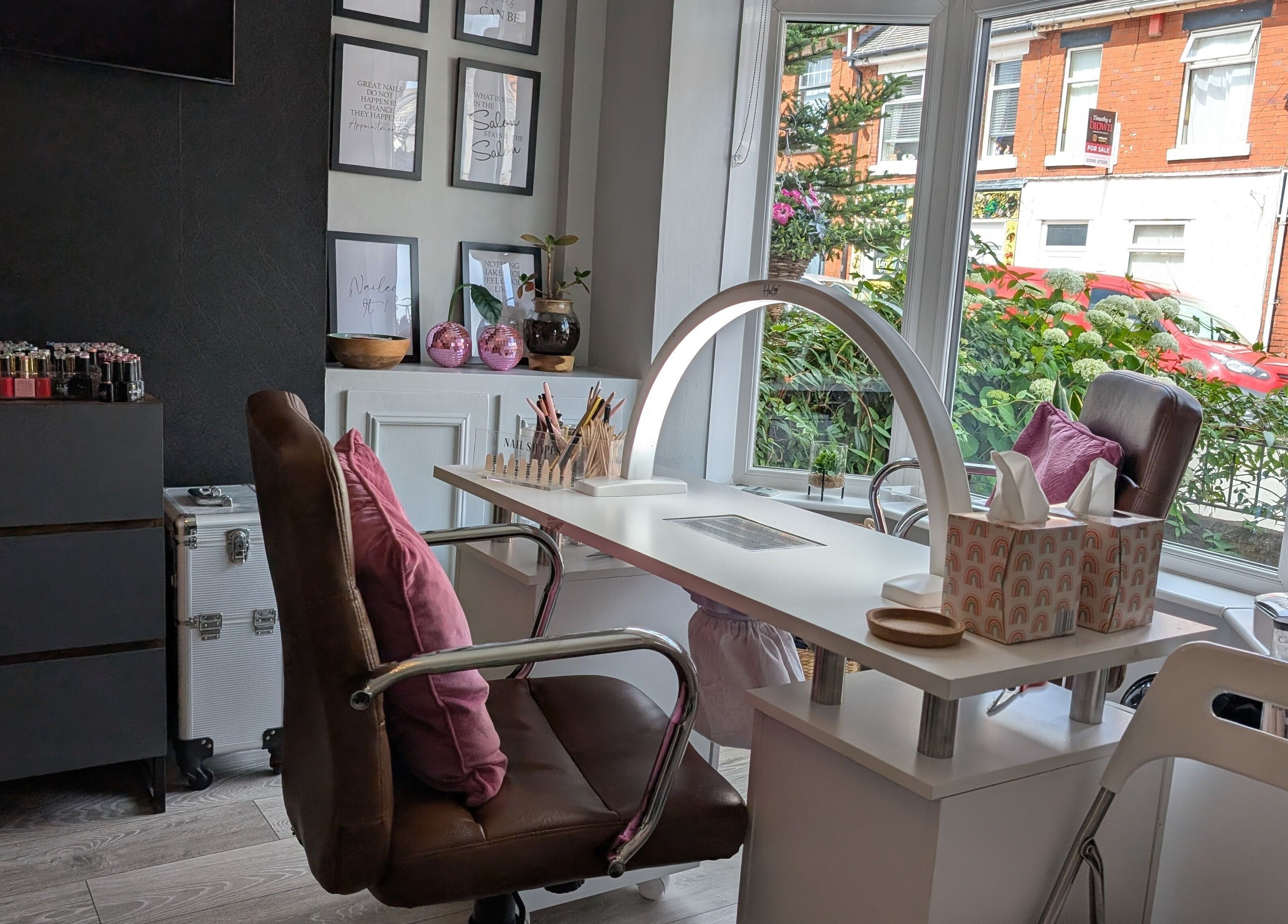 Stylish nail station at Nails by Paula X in Biddulph, England, GB with natural light and cozy ambiance.