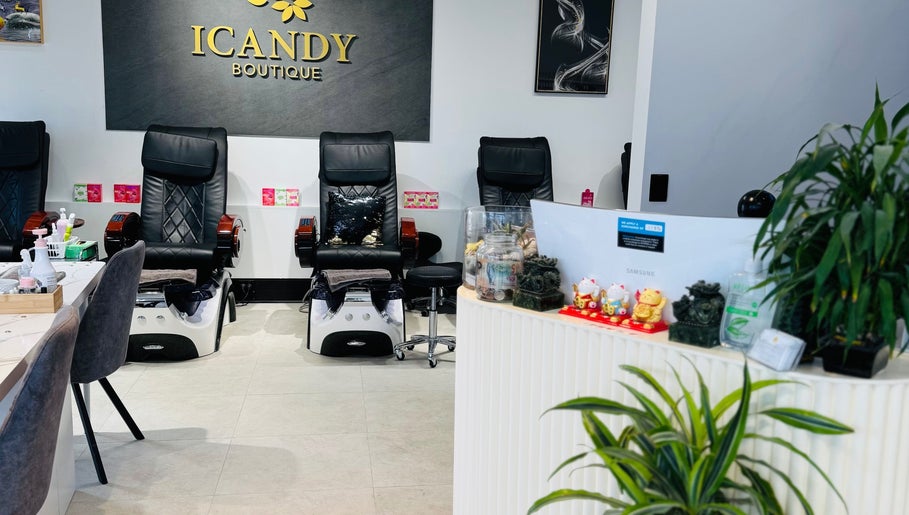 ICandy Boutique's chic interior with plush chairs in Auckland, Auckland, NZ, perfect for a pampering session.