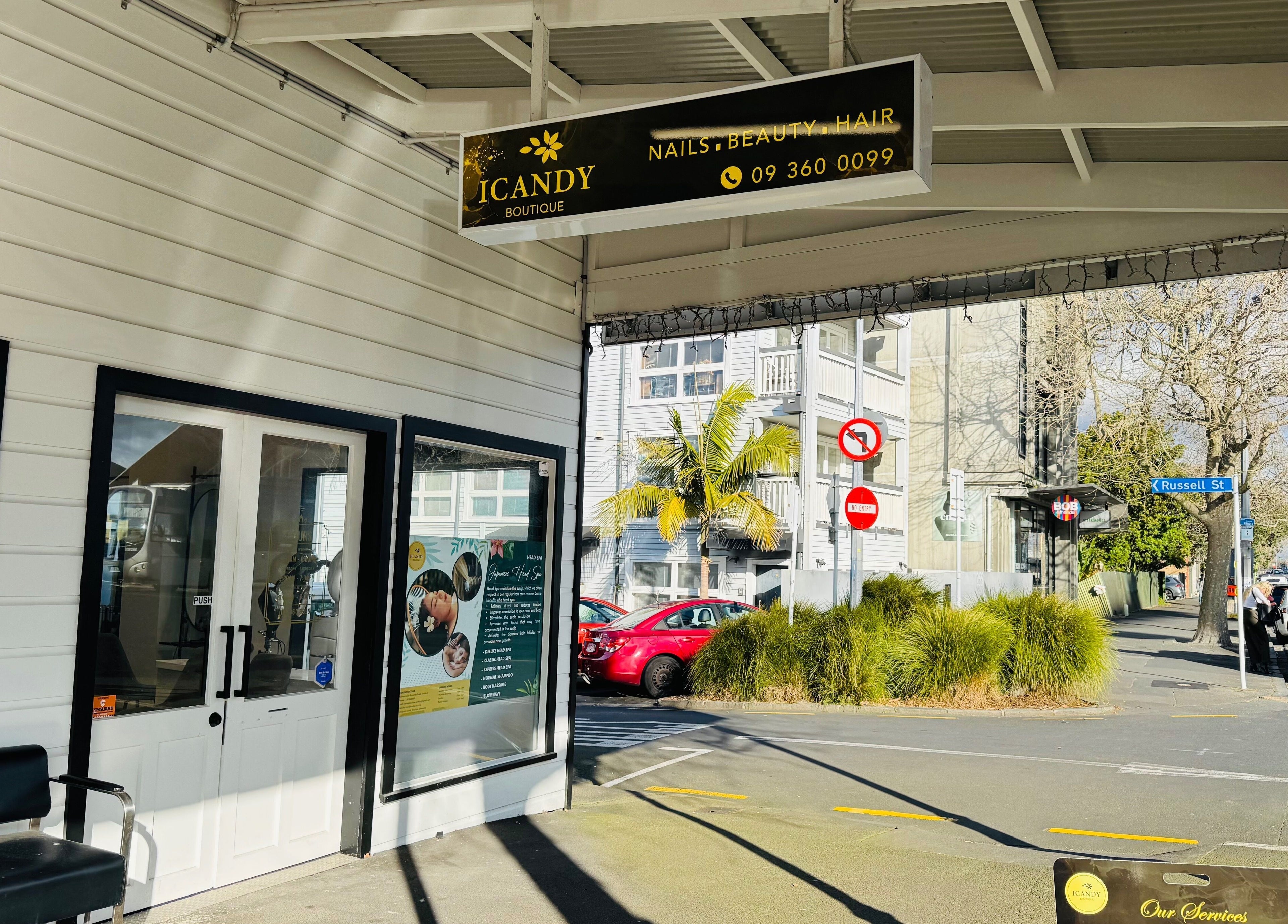 Front view of ICandy Boutique on Russell St, Auckland, offering beauty and wellness services.
