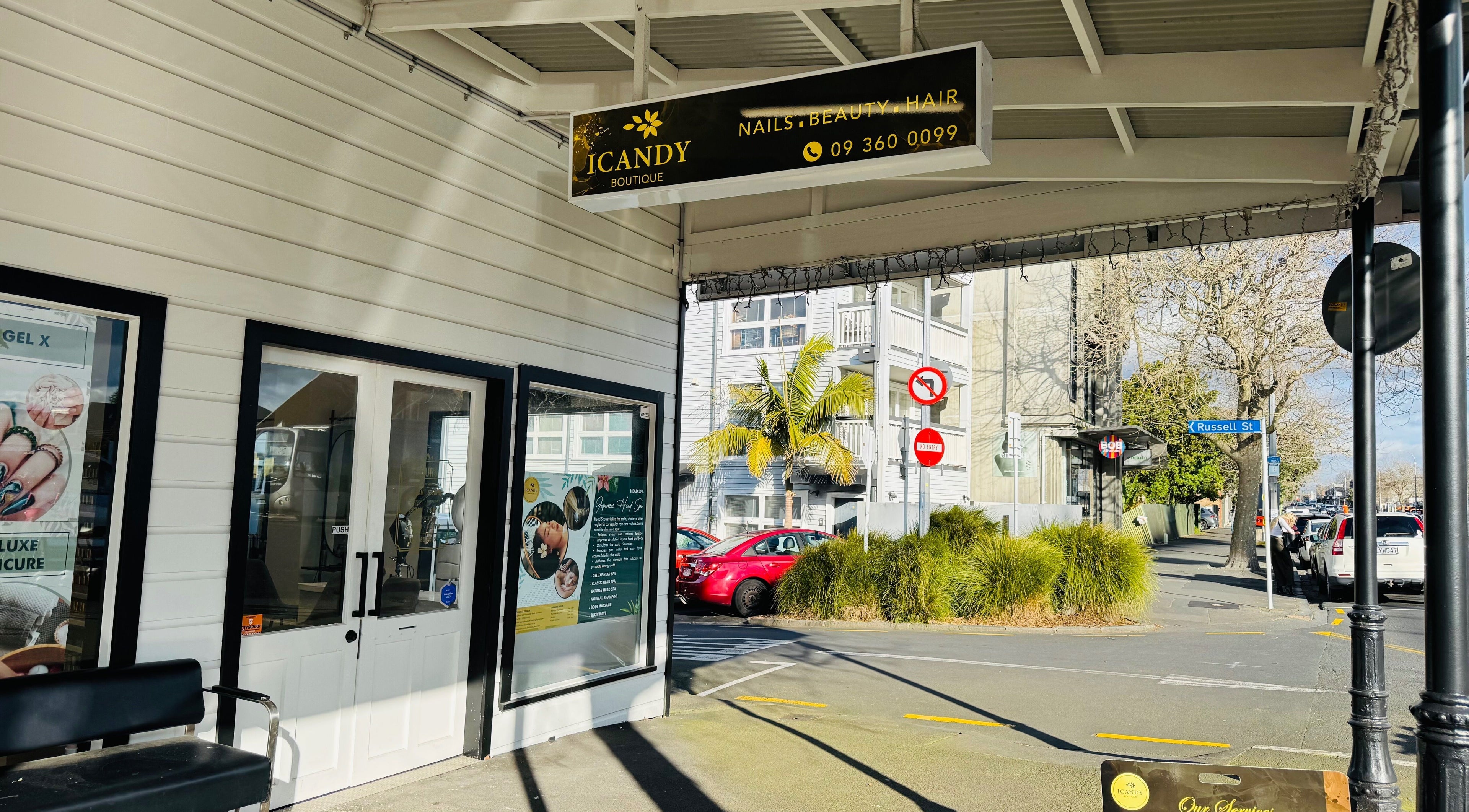 Front view of ICandy Boutique on Russell St, Auckland, offering beauty and wellness services.