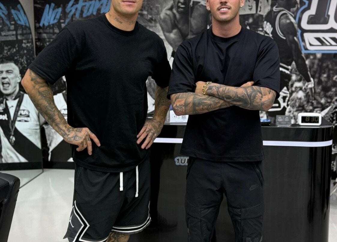 Stylishly tattooed barbers at 1UP Barbershop Bicton in Bicton, Western Australia, AU showcase modern artistry.