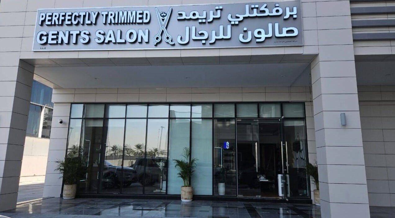 Facade of Perfectly Trimmed Gents Salon located in Abu Dhabi, Abu Dhabi, AE with modern design.