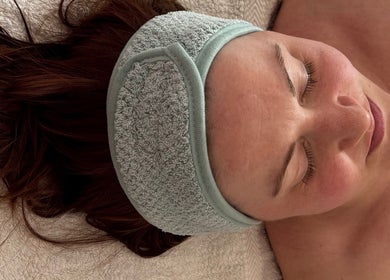 Relaxed woman enjoying a facial treatment at The Happy Skin Technician, Sheffield, England, GB.
