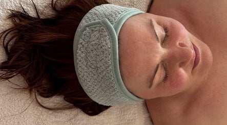 Relaxed woman enjoying a facial treatment at The Happy Skin Technician, Sheffield, England, GB.
