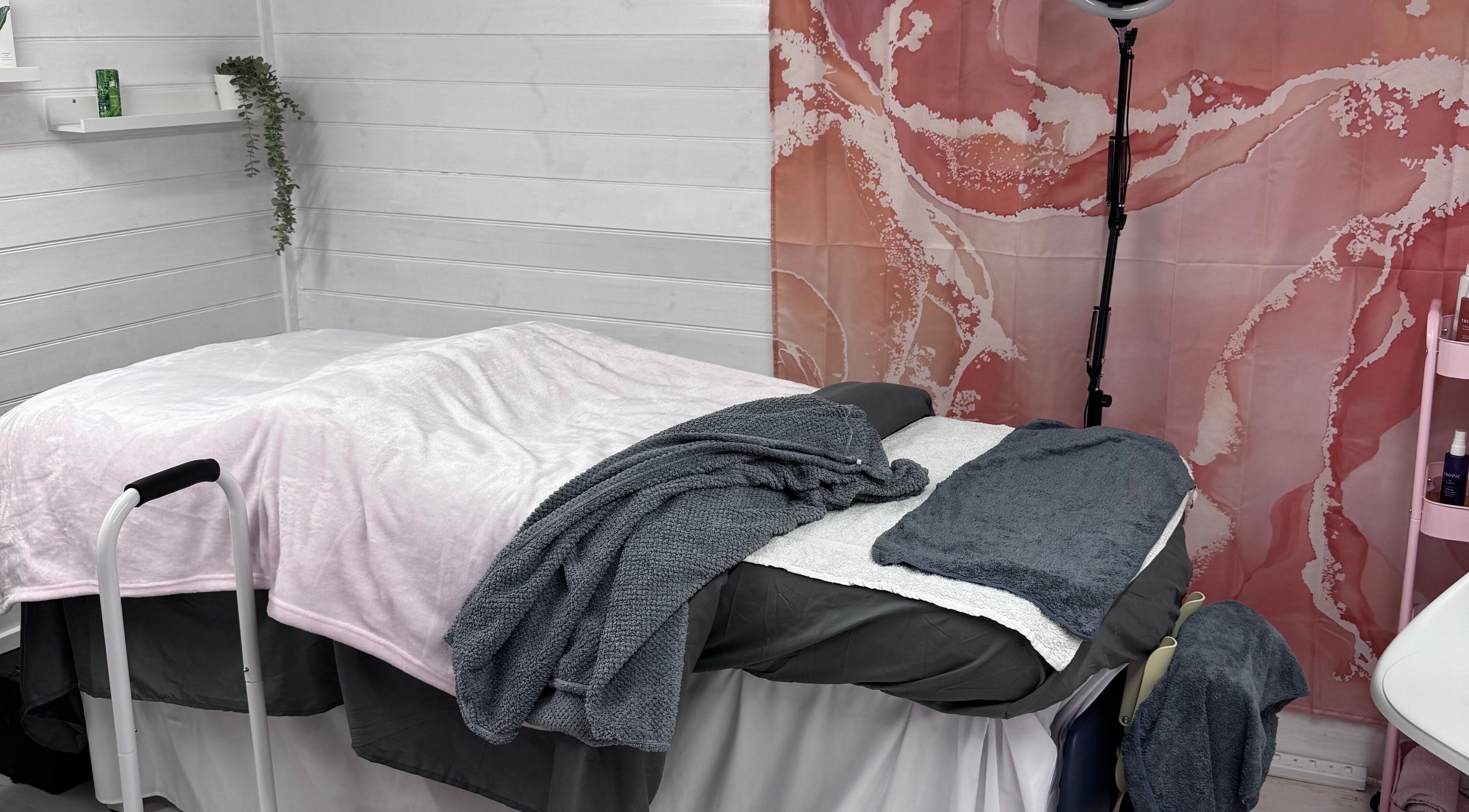 Cozy treatment room with soft blankets at The Happy Skin Technician, Sheffield, England, GB.