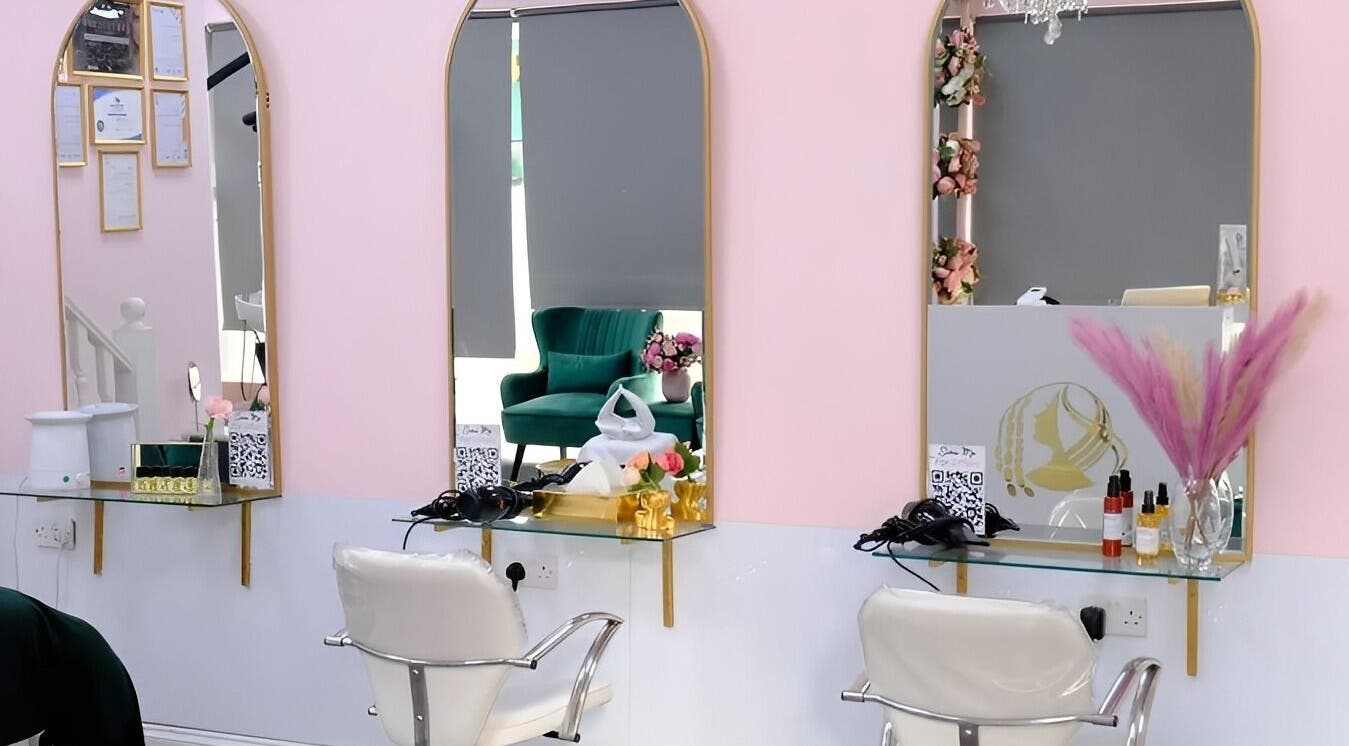 Modern salon stations at City of London Beauty Academy ltd, London, England, GB with chic decor and mirrors.