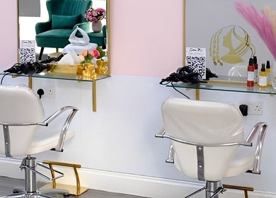 Elegant salon chairs in City of London Beauty Academy ltd, London, England, GB. Modern and chic interior decor.
