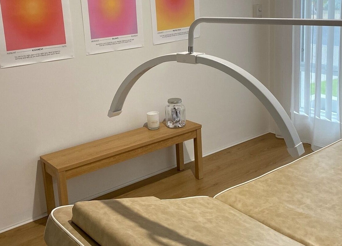 Calming treatment room at Muse in Vasse, Western Australia, AU, featuring cozy decor and natural light.