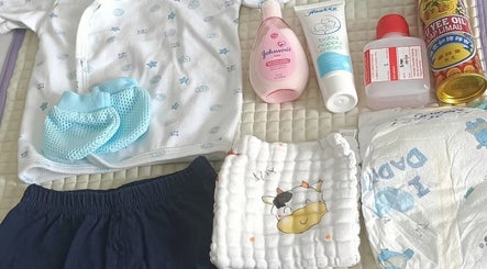 Baby essentials set at Erin Confinement Lady Empire, Semenyih, Selangor, MY featuring clothing and care products.
