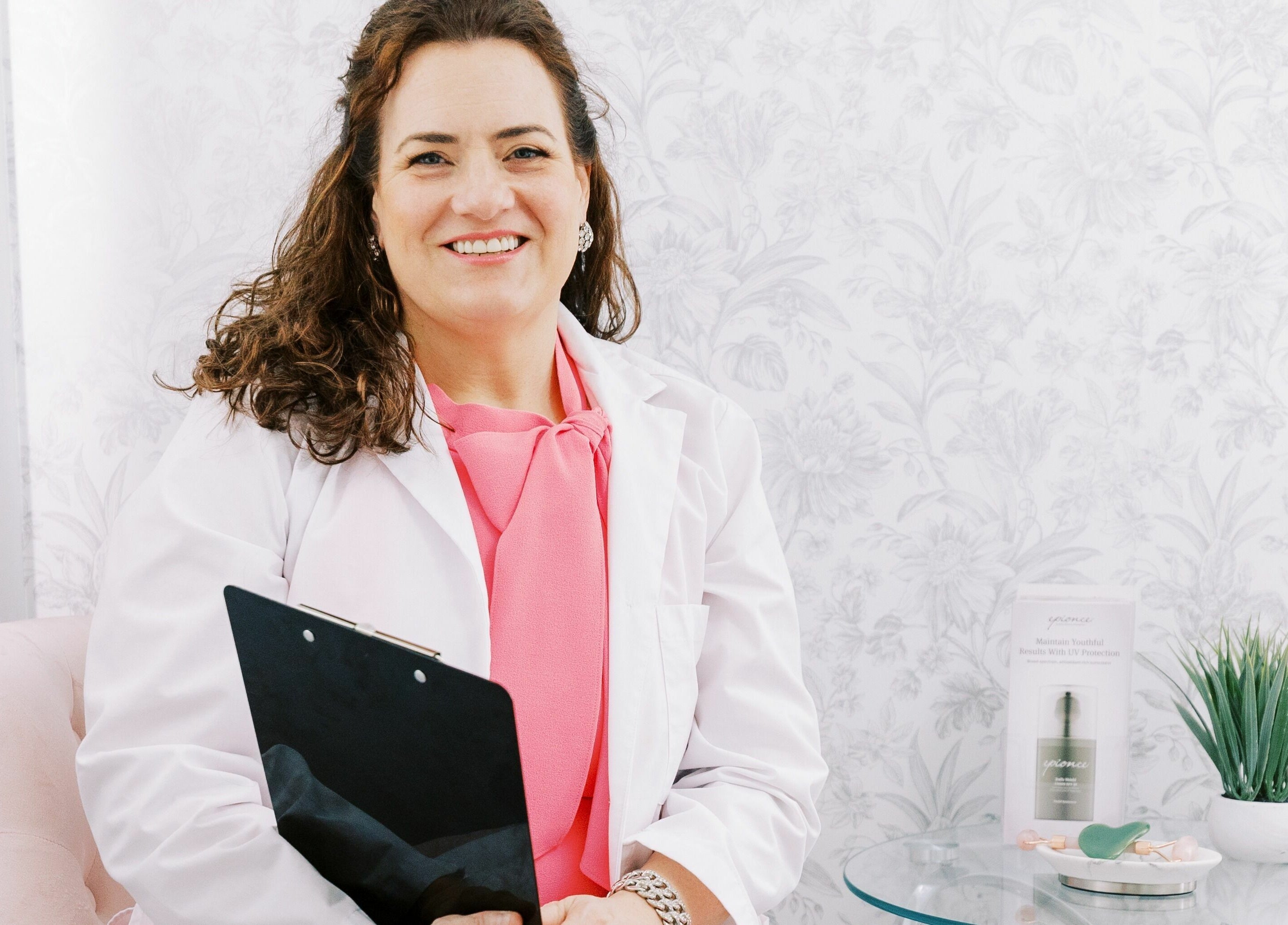 Consulting professional at Village Skin Sanctuary, Audubon, Pennsylvania, US, in a welcoming setting.