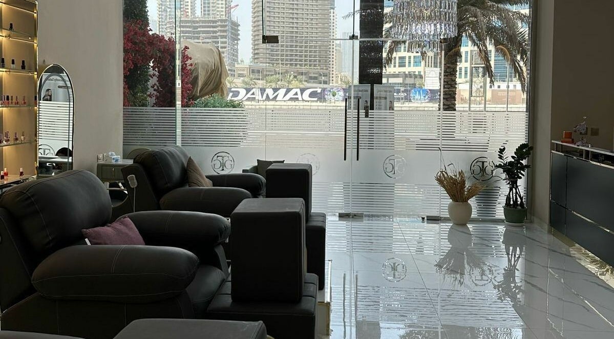 Luxurious interior of Gulshat Beauty Salon in Dubai, Dubai, AE, featuring modern chairs and large windows.