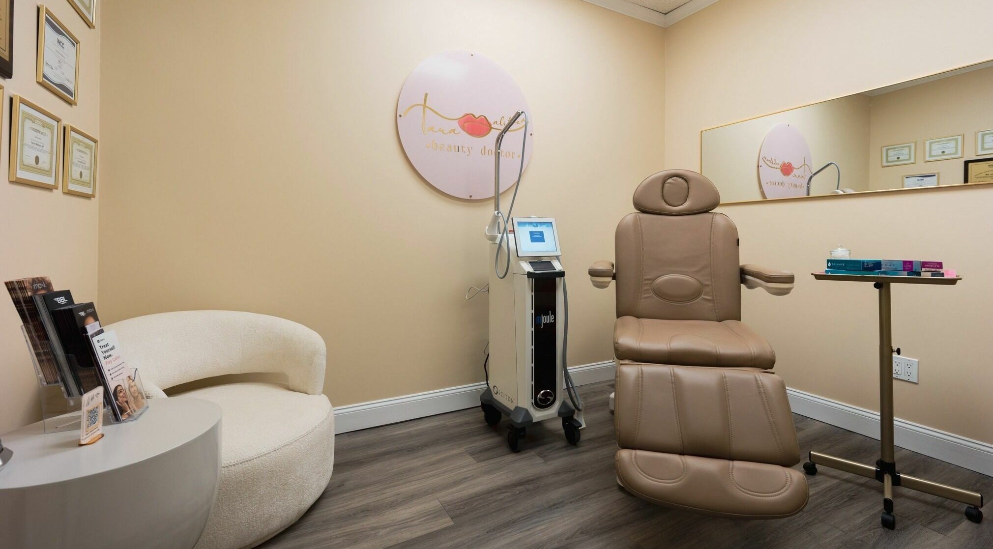 Luxury treatment room at Beauty Doctor Tara's Medspa, East Rockaway, New York, with modern equipment and seating.