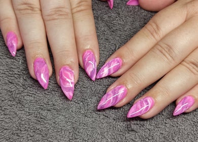 Elegant pink marble nails at Black Cat Collective, Port Elizabeth, Eastern Cape, ZA showcasing expert nail art.